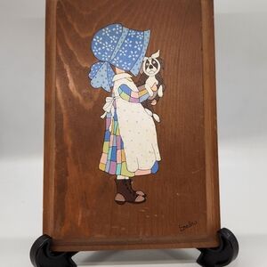 Vintage Wooden Plaque with Girl and Dog Illustration